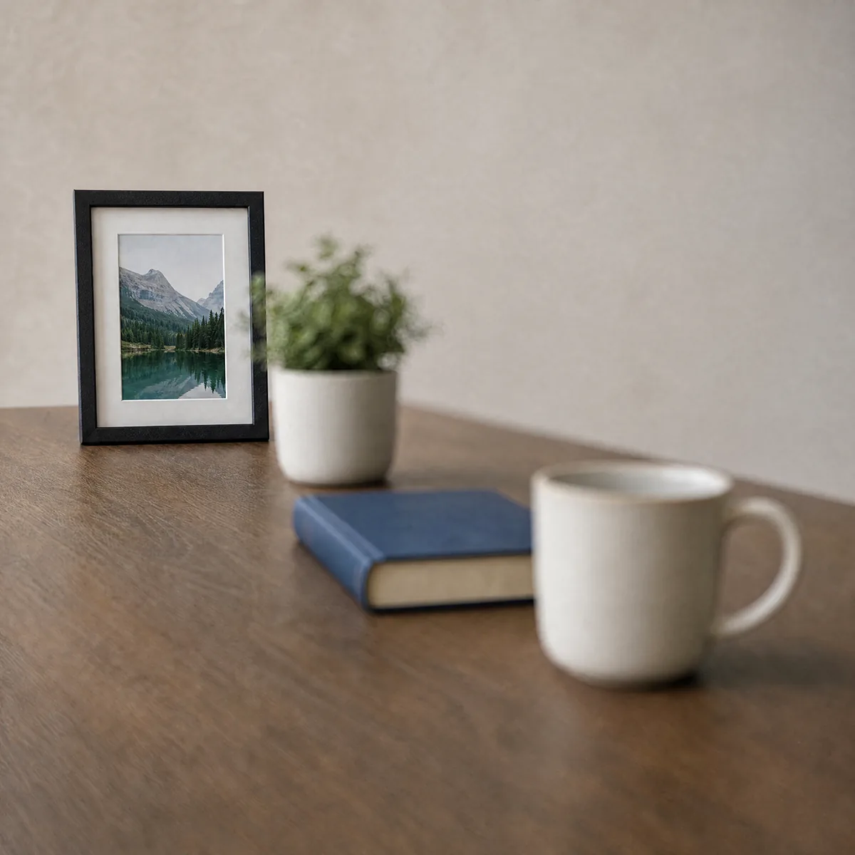 A desk refocused by Radbin on four different objects — Frame