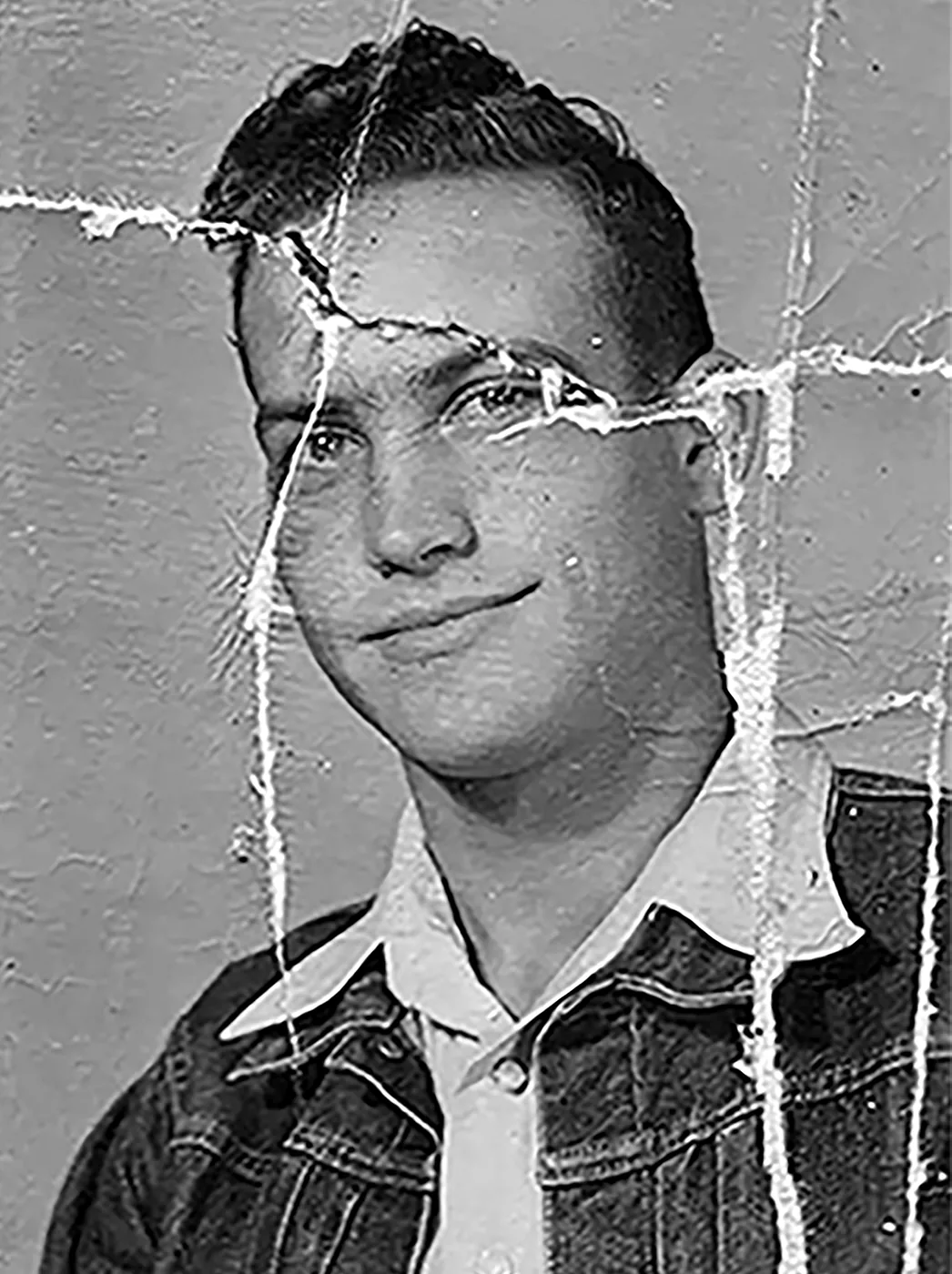 Old torn black and white portrait restored to colour — before